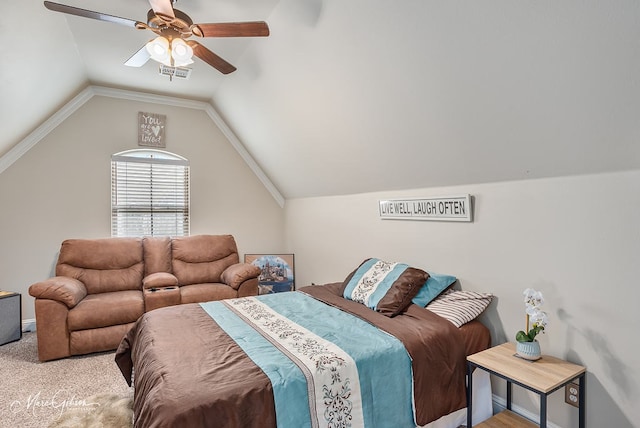 bedroom featuring vaulted ceiling, carpet floors, and ceiling fan