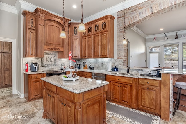 kitchen with pendant lighting, sink, stainless steel appliances, a center island, and tasteful backsplash