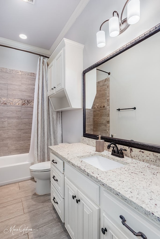 full bathroom with toilet, vanity, shower / bath combination with curtain, and ornamental molding