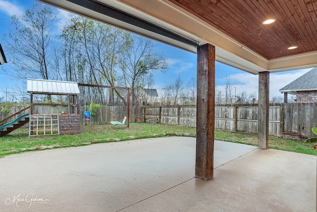 view of patio featuring a playground