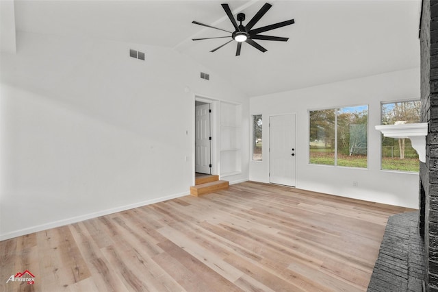 unfurnished living room with ceiling fan, light hardwood / wood-style flooring, and lofted ceiling