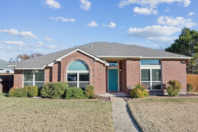 ranch-style house with a front yard