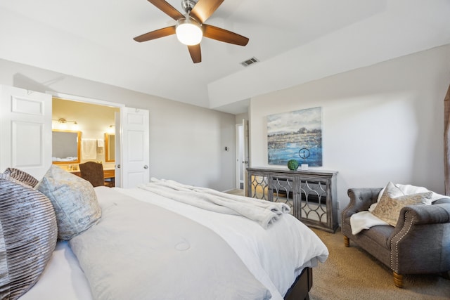 carpeted bedroom featuring connected bathroom and ceiling fan