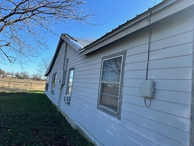 view of home's exterior featuring a yard