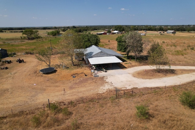 birds eye view of property featuring a rural view