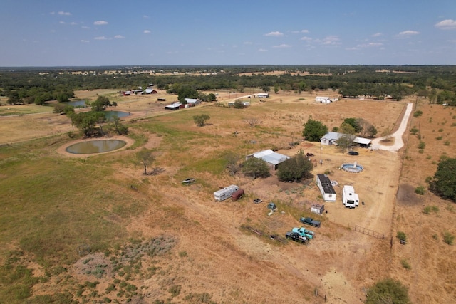 bird's eye view featuring a water view and a rural view