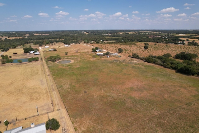 birds eye view of property featuring a rural view