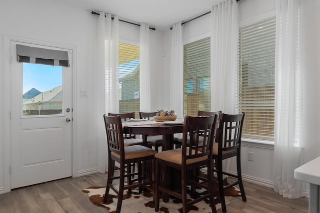 dining room featuring light hardwood / wood-style flooring