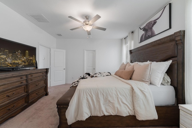 bedroom featuring ceiling fan and carpet floors