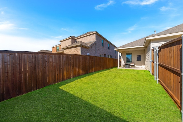 view of yard with a patio area