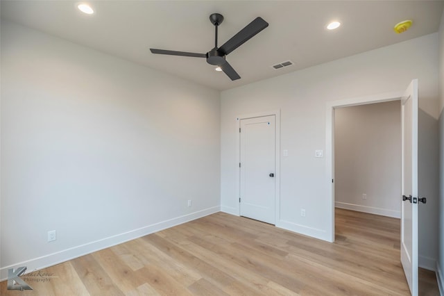 unfurnished bedroom featuring ceiling fan and light hardwood / wood-style flooring