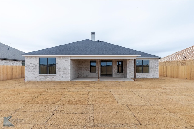 back of house featuring a patio