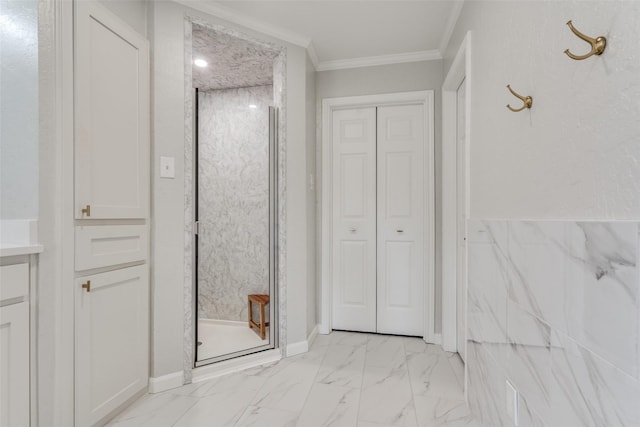 bathroom with crown molding and walk in shower