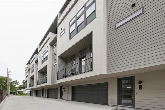 view of building exterior featuring a garage