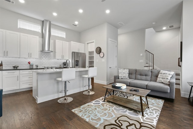 living room with dark wood-type flooring