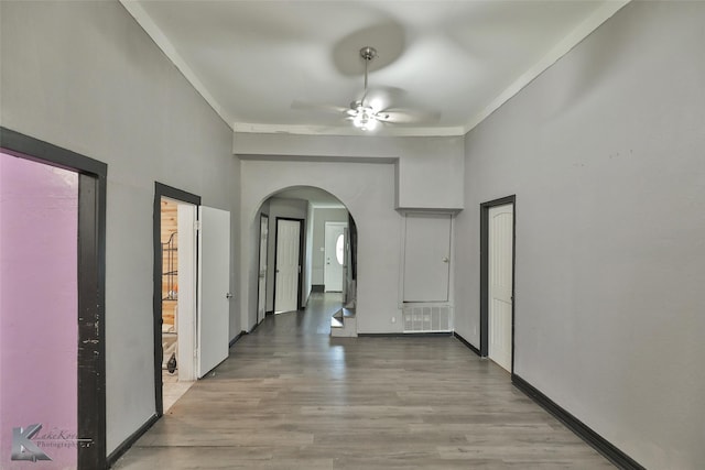 corridor with light hardwood / wood-style flooring