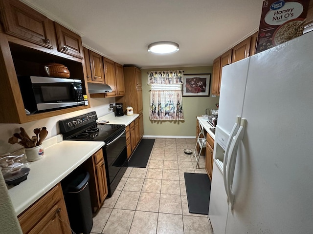 kitchen featuring white refrigerator with ice dispenser, light countertops, stainless steel microwave, black range with electric stovetop, and under cabinet range hood