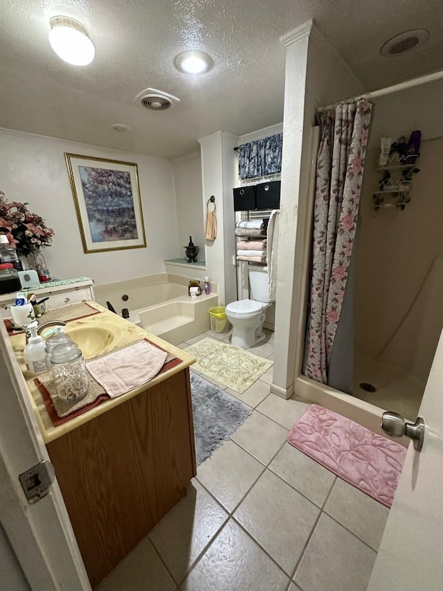 full bathroom with toilet, separate shower and tub, a textured ceiling, vanity, and tile patterned flooring