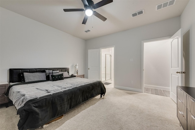 bedroom featuring ceiling fan and light carpet