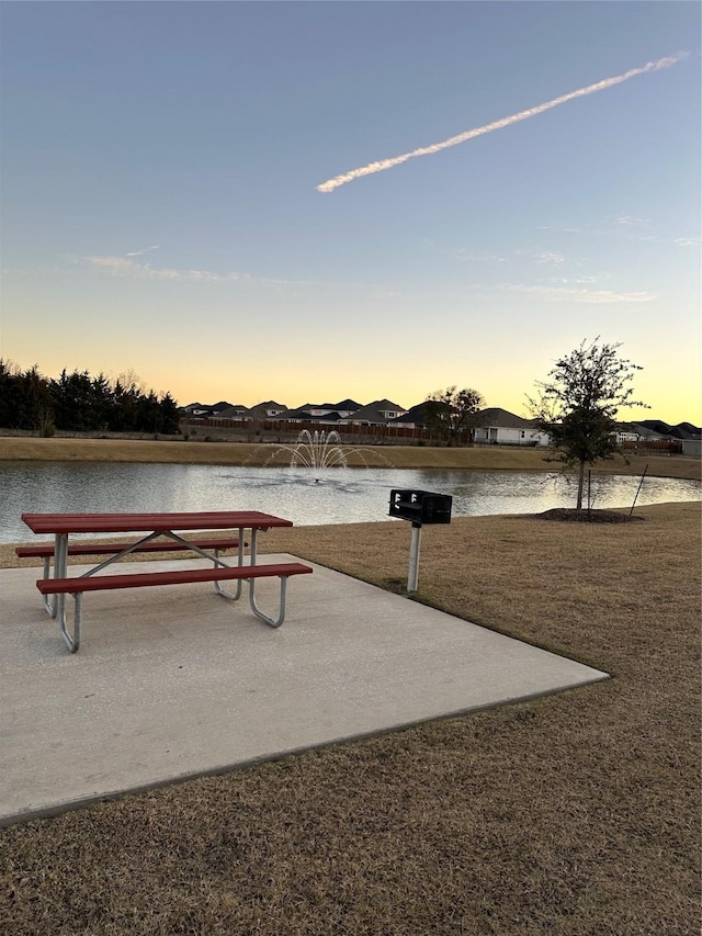 view of home's community featuring a water view