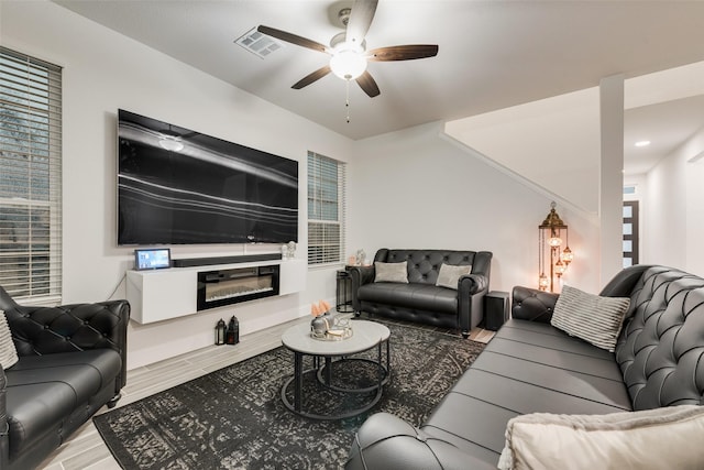 living room featuring ceiling fan