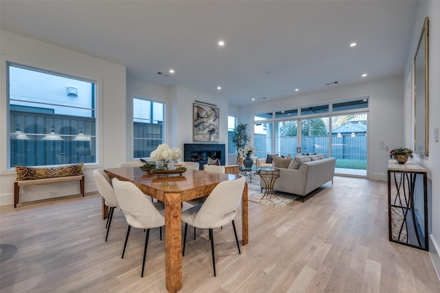 dining space featuring light hardwood / wood-style flooring