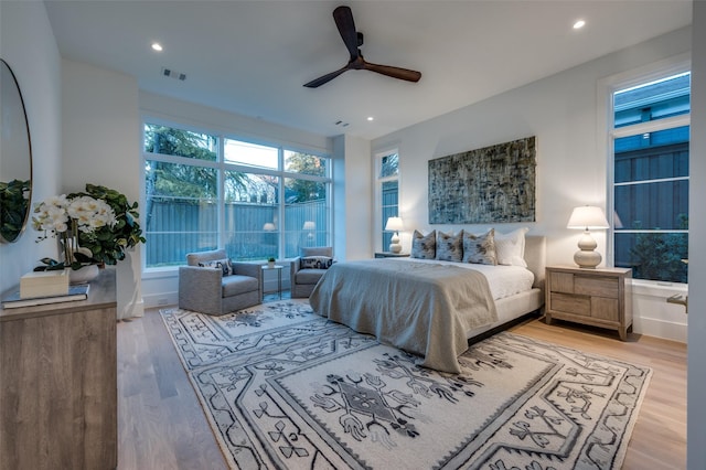 bedroom featuring hardwood / wood-style floors and ceiling fan