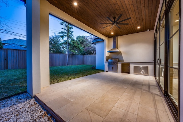 view of patio / terrace with ceiling fan and area for grilling