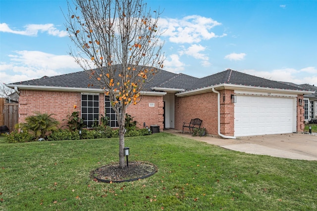 ranch-style home with a front yard and a garage