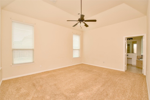 carpeted empty room with ceiling fan