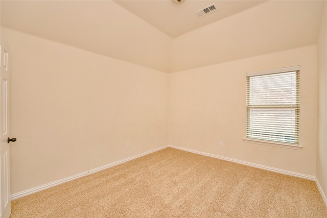 unfurnished room featuring light colored carpet