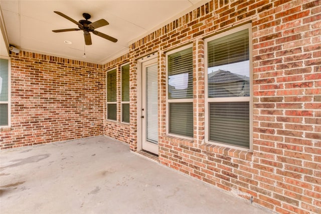 view of patio / terrace featuring ceiling fan