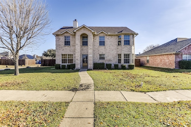 view of front of house with a front lawn