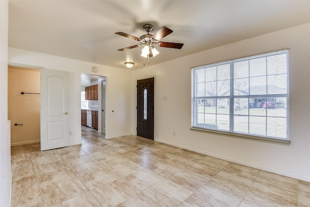 empty room featuring ceiling fan