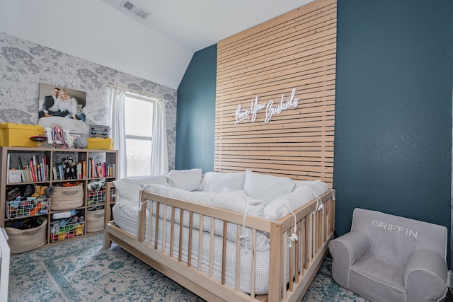 bedroom featuring lofted ceiling