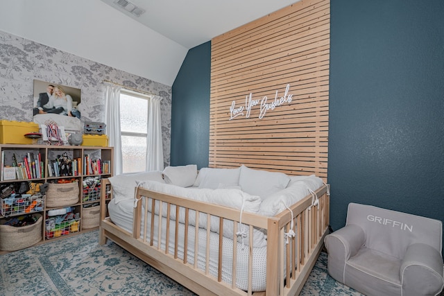 bedroom featuring lofted ceiling