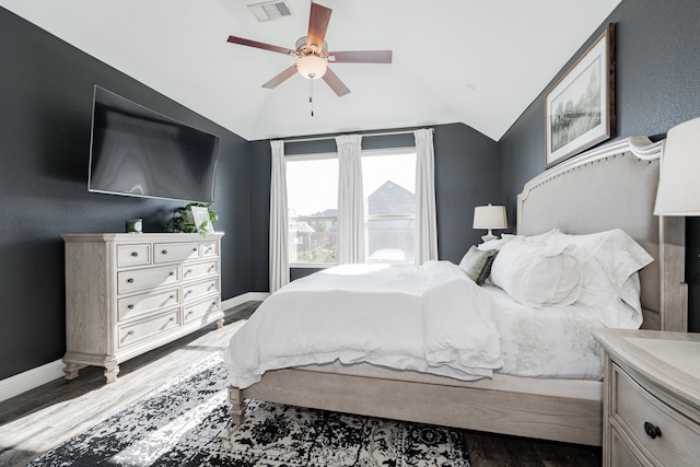 bedroom featuring wood-type flooring, ceiling fan, and lofted ceiling