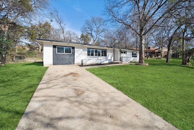 ranch-style house with a front yard