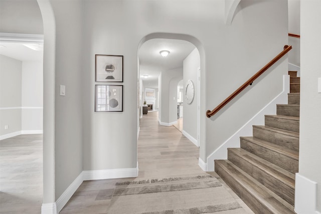 entryway with light hardwood / wood-style floors