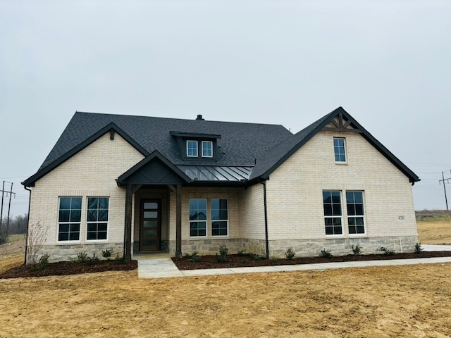 view of front of home with a front lawn