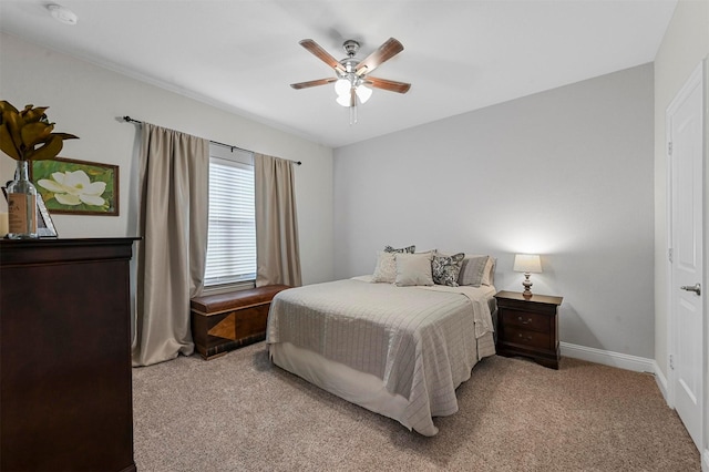 bedroom featuring light carpet and ceiling fan