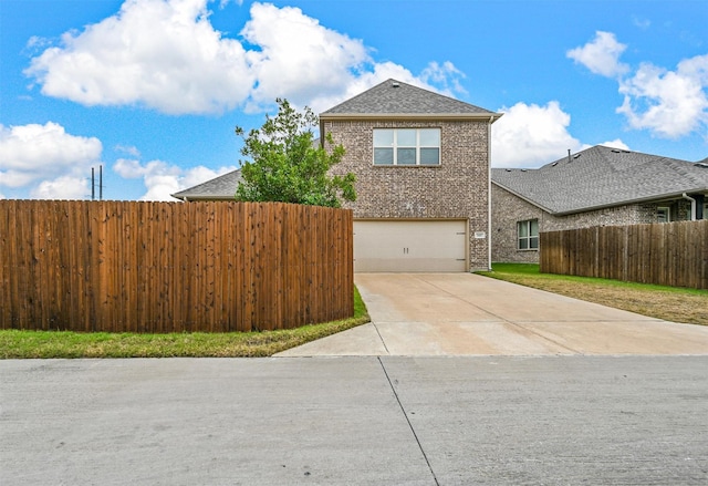 view of front property with a garage