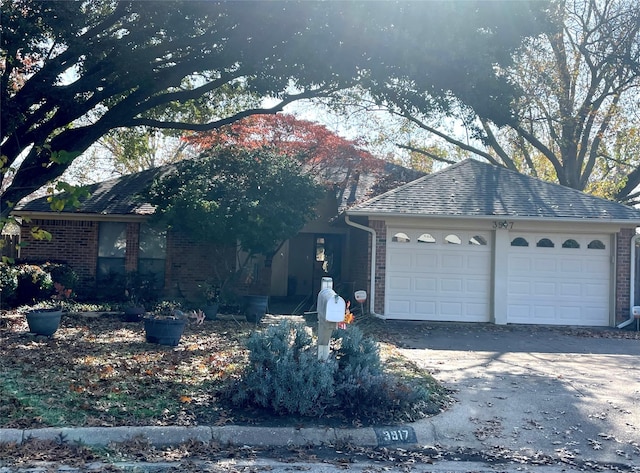 ranch-style home with a garage