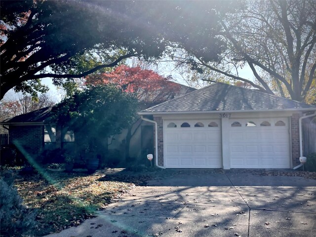 exterior space with a garage