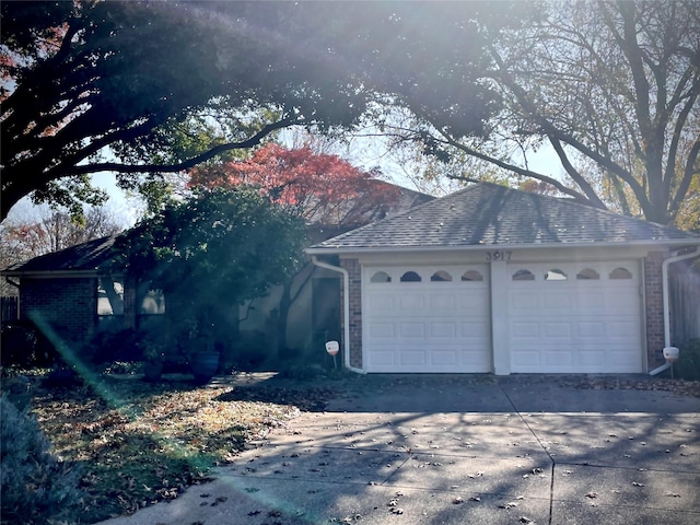 exterior space with a garage