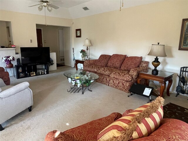 carpeted living room featuring ceiling fan