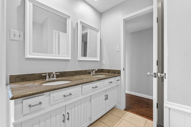 bathroom with vanity and tile patterned floors