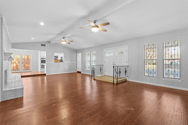 unfurnished living room with hardwood / wood-style floors, vaulted ceiling with beams, and ceiling fan