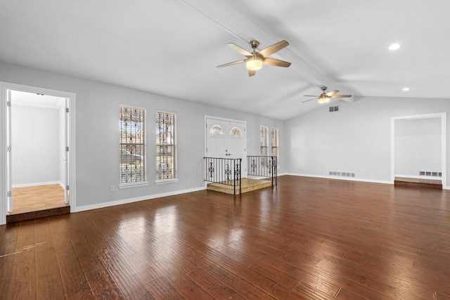 unfurnished living room with vaulted ceiling with beams, ceiling fan, and dark hardwood / wood-style flooring