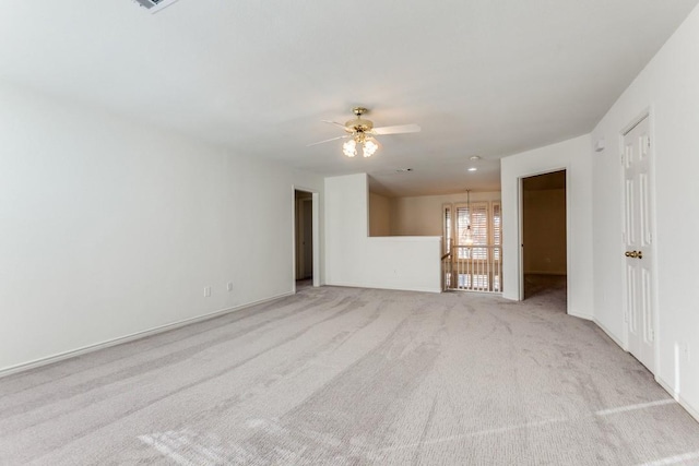 empty room with light carpet and ceiling fan